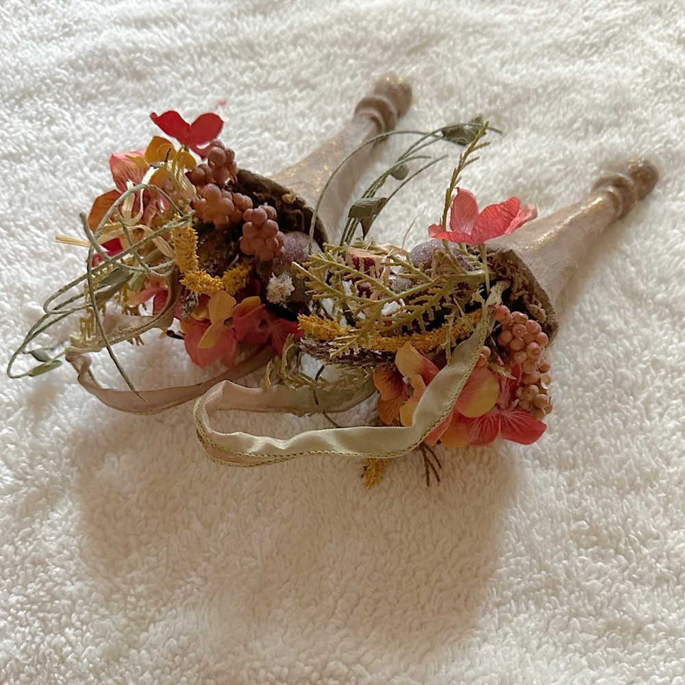Two Flower-filled Sconces